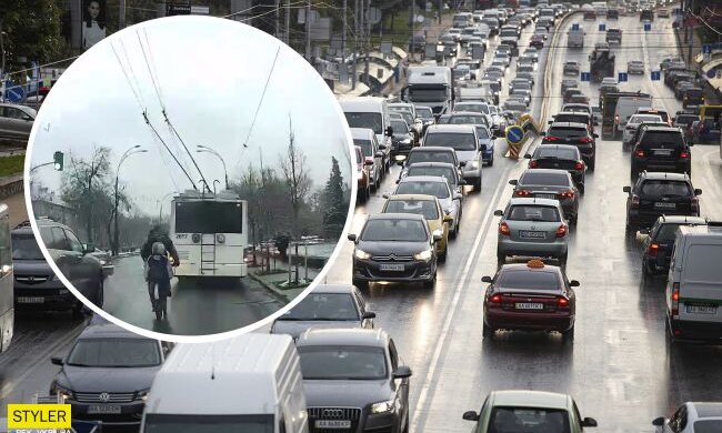 У Києві на відео потрапив льотчик-велосипедист з дитиною: тягався з тролейбусом і виїжджав на “зустрічку”