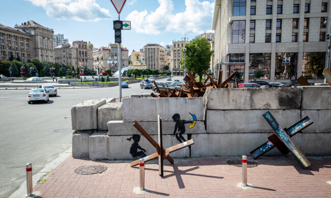 Мурал Бенксі «Діти на «гойдалках» на Хрещатику законсервують