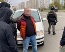 Погрожували йому та родині: у Києві затримали банду, яка вимагала гроші у підприємця (фото)