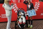 Киянка пробігла марафонську дистанцію із дитиною — що за цікавий рекорд встановили у столиці?