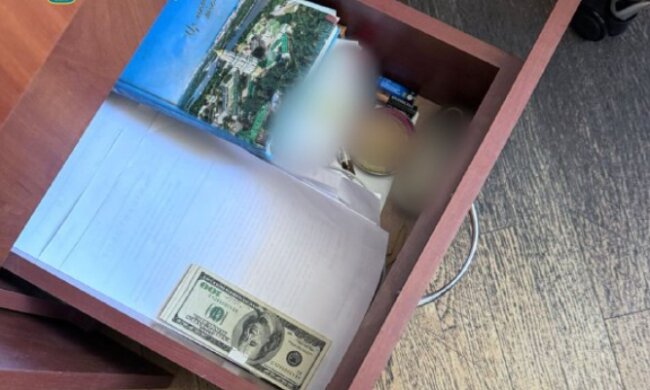 $2000 за укладання договору зі зберігання майна – повідомлено про підозру інженеру столичного КП