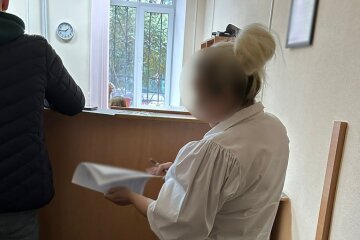 Чиновниця КМДА переоформила на себе заарештовану столичну квартиру