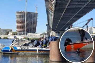 Поліцейські та водолази пірнають у Дніпро для огляду Подільського моста