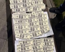 По 10 тисяч доларів за «бронь»: у Києві судитимуть колишнього патрульного