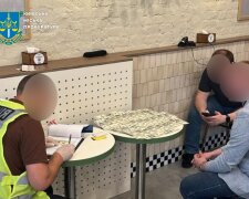 У Києві викрили шахрайську схему, за якою обіцяли допомогти у вирішенні проблем з ВЛК